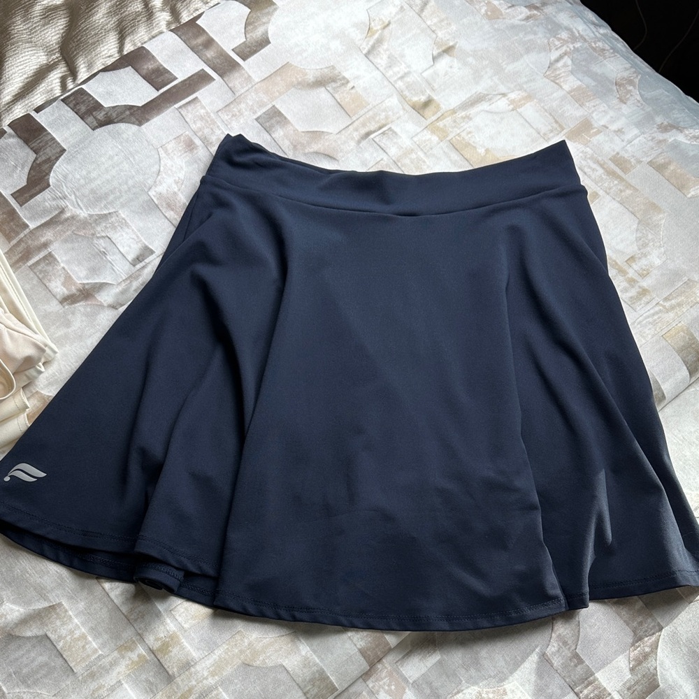 Stylish Navy Fabletics Sport Skirt with inbuilt shorts. Size L